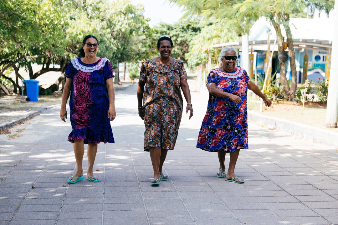 The women walking doe the street on Warraber Island